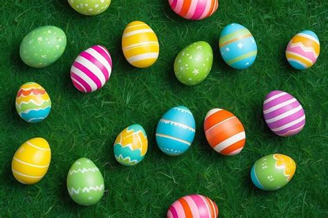 Premium Photo Colorful Easter Eggs On Green Grass