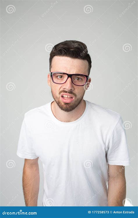 Young Man Isolated Over Background Vertical Picture Of Nerd Or Weirdo