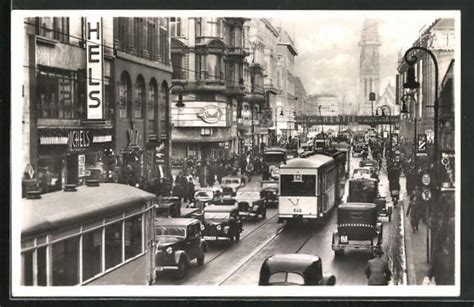 Ansichtskarte Berlin Königstrasse mit Geschäften und Strassenbahn