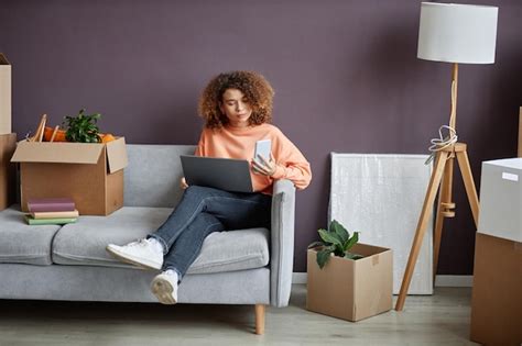 Premium Photo | Woman using wireless gadgets at home