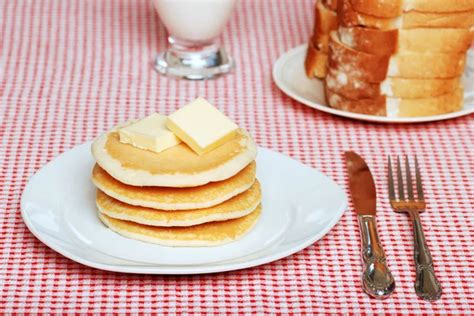 Pancakes with syrup and butter — Stock Photo © mcgphoto #3892551