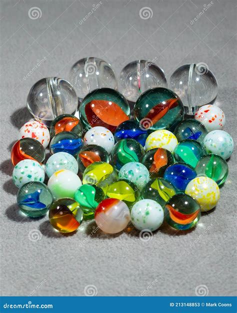 A Collection Of Various Types And Sizes Of Marbles Grouped Together