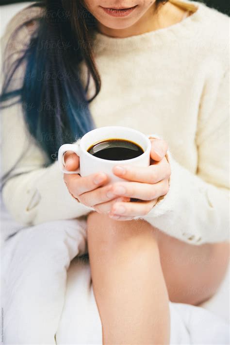 Crop Woman Holding Cup Of Coffee Del Colaborador De Stocksy Andrey