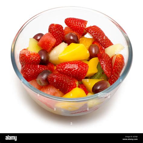 Fruit Salad bowl cut out onto a white background Stock Photo - Alamy