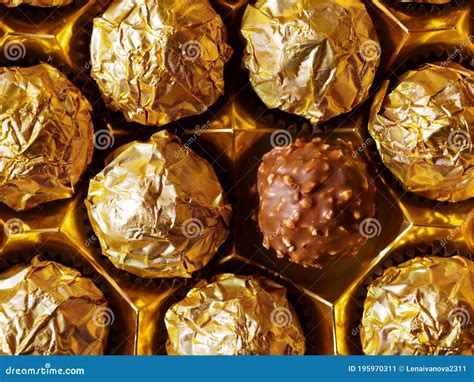 Chocolate Balls Wrapped In Gold Foil Stock Image