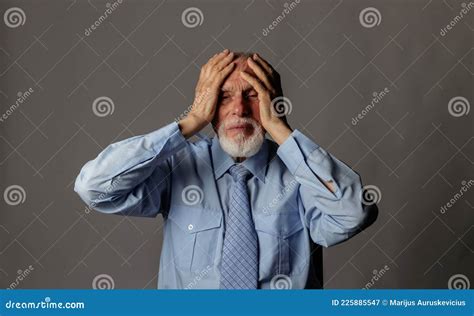 Old Man In Thoughts Old Man In Blue Is Having A Headache Stock Image