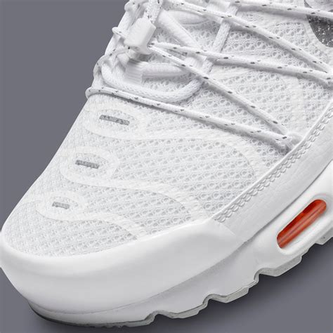 The Nike Air Max Plus Toggle Appears In White Grey And Orange House