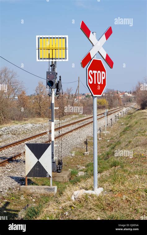 Unguarded Railway Crossing With Railways Signs Stock Photo Alamy