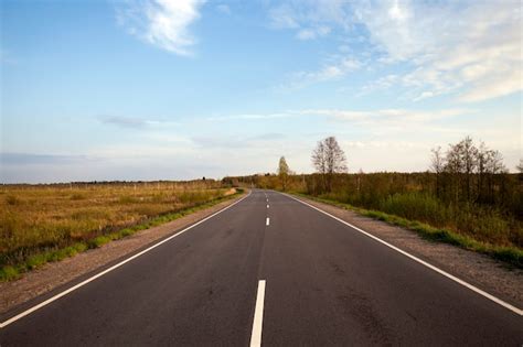 Premium Photo Let The Asphalt Road In The Countryside Pass Through