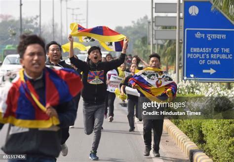 Tibetan Exiles Protest During 58th Tibetan National Uprising Day Photos