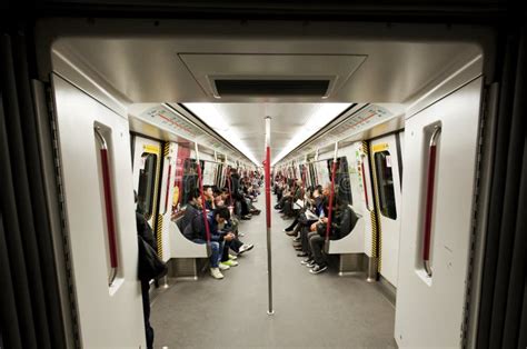 Commuters Inside A Subway Train In Hong Kong Editorial Stock Image