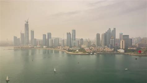 Day Time Flight Over Qingdao City Downtown Bay Aerial Timelapse