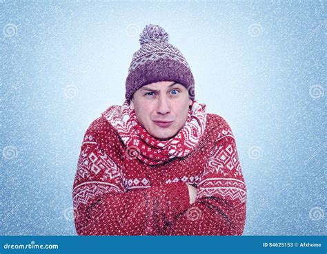 Frozen Man In Sweater Scarf And Hat Warming Hands Cold Snow