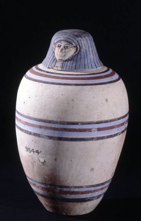 Painted Pottery Canopic Jar Human Headed Lid With A Striped Wig And