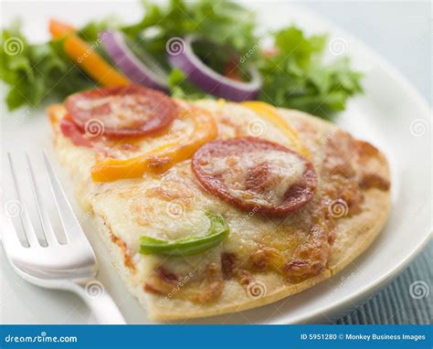 Slice Of Pepperoni And Pepper Pizza With Salad Stock Photo Image Of