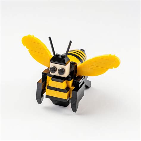 lego built flying bee toy  white isolated background premium ai