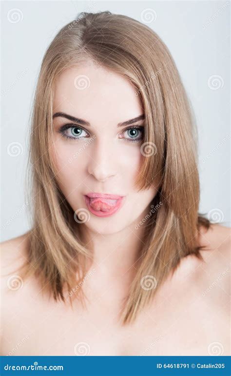 Beautiful Woman Model Sticking Tongue Out As Funny Face Concept Stock Image Image Of Care