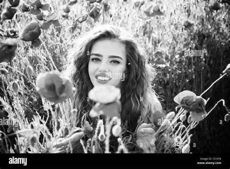 Woman Or Happy Girl In Field Of Poppy Seed Stock Photo Alamy