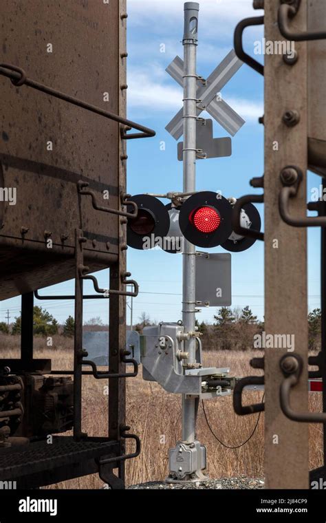 Active railroad crossing with flashing emergency lights, Michigan, USA ...