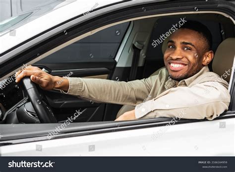 handsome black man driving  car stock photo  shutterstock