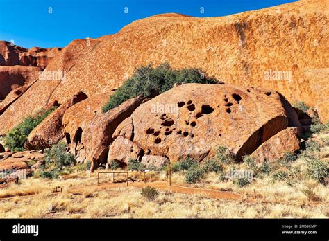 Hiking around Uluru Ayers Rock. Northern Territory. Australia Stock ...