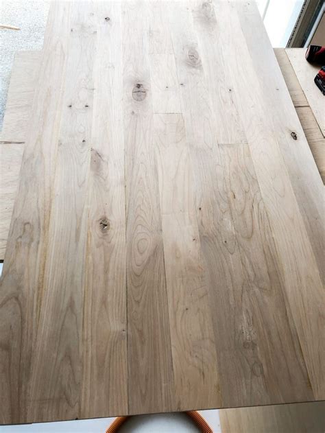 A Table That Has Some Wood On Top Of It