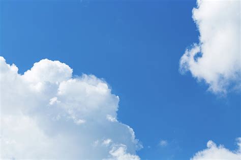 Big White Clouds Against Dark Blue Sky Photograph By Henning Marquardt