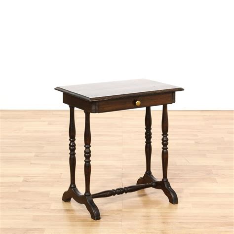 This Antique End Table Is Featured In A Solid Wood With A Glossy Rustic