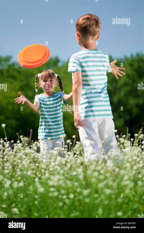 Children Playing Frisbee Stock Photo Alamy