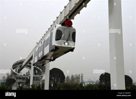 An Elevated New Energy Monorail Train Travels Along A Km Track