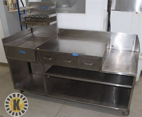 STAINLESS STEEL TABLE WITH DRAWERS, SHELVES