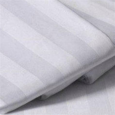 White Plain Solids Micro Patti Polyester Cloth For Bed Sheet Fiber