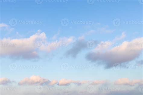 chain of fluffy clouds in blue sunset sky 11462599 Stock Photo at Vecteezy