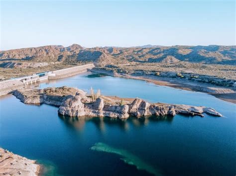 Premium Photo Aerial View Of Blue Lake With Mountains