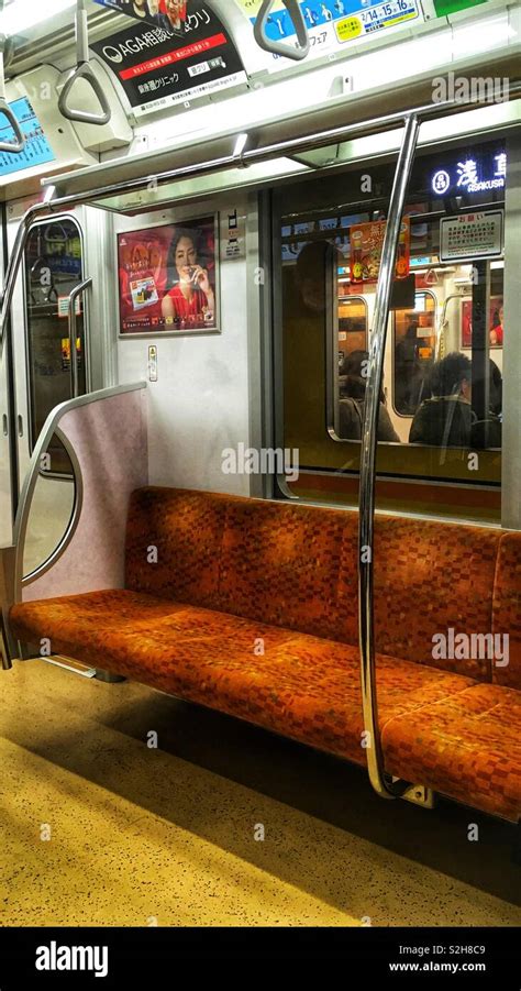 Inside a Tokyo Metro train Stock Photo - Alamy