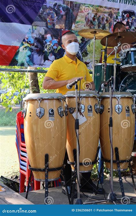 Male Musicians Wearing Masks To Prevent The Virus Playing Drums At A