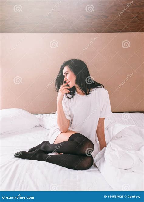 Dreamy Pensive Woman T Shirt Black Stockings Bed Stock Image Image Of Female Beautiful 164554025