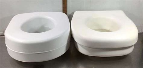 2 Toilet Seat Risers - Sherwood Auctions