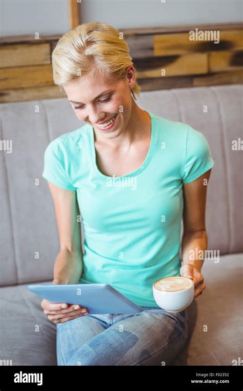 Pretty Blonde Using Laptop Computer Stock Photo Alamy