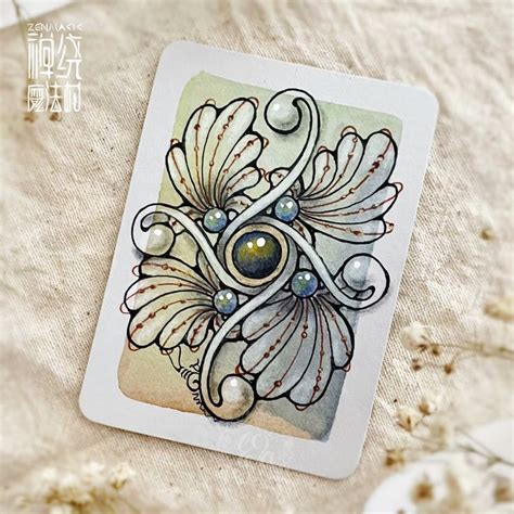 A Card With An Intricate Design On It