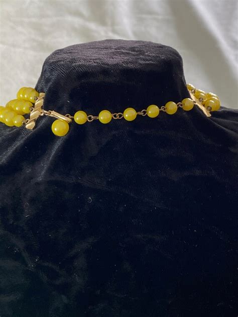 Mid Century Three Strand Yellow Pearl With Opalescent Gem