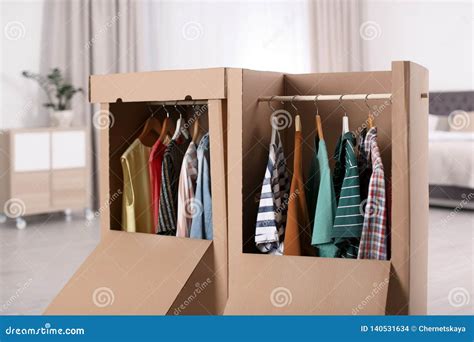 Cardboard Wardrobe Boxes With Clothes On Hangers Stock Photo Image Of