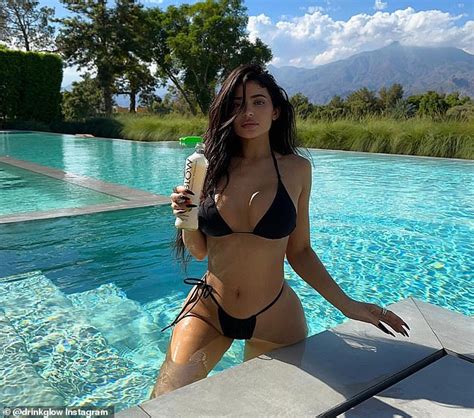 Kylie Jenner Wears Tiny Black Bikini For Swimming Pool Photos To