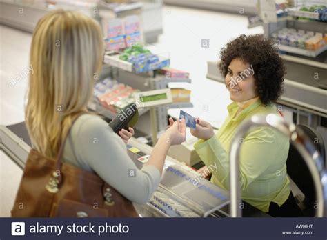 Woman At Grocery Store Check Out Stock Photo Royalty Free Image