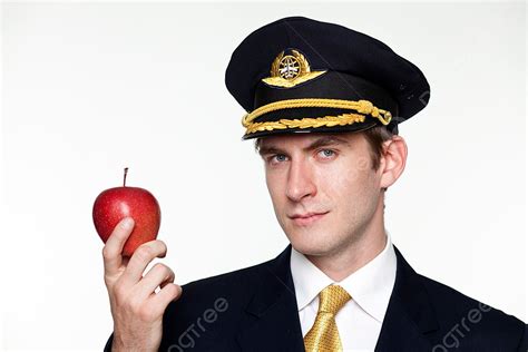 Adolescent Male Dressed In The Attire Of A Commercial Airline Pilot