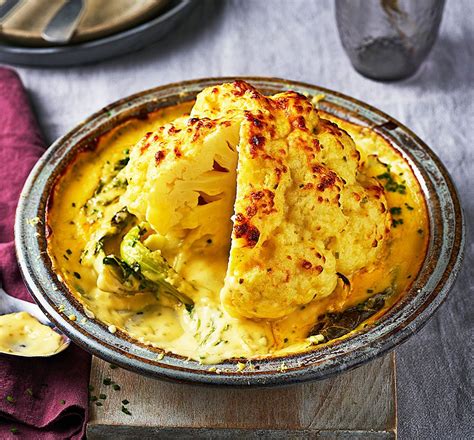 Hearty And Comforting Whole Baked Cauliflower Cheese