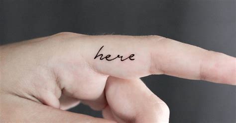 Word Here Temporary Lettering Tattoo Placed On The