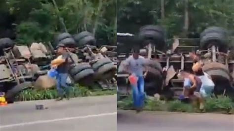 Carreta de bebidas tomba na BR 381 e carga é saqueada em Ravena Grande BH