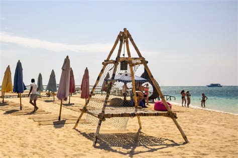 People On Beach On Sunny Day Beach Holidays Relaxation Swimming In