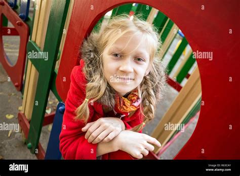 Portrait Blonde Girl At The Playground Close Up Stock Photo Alamy